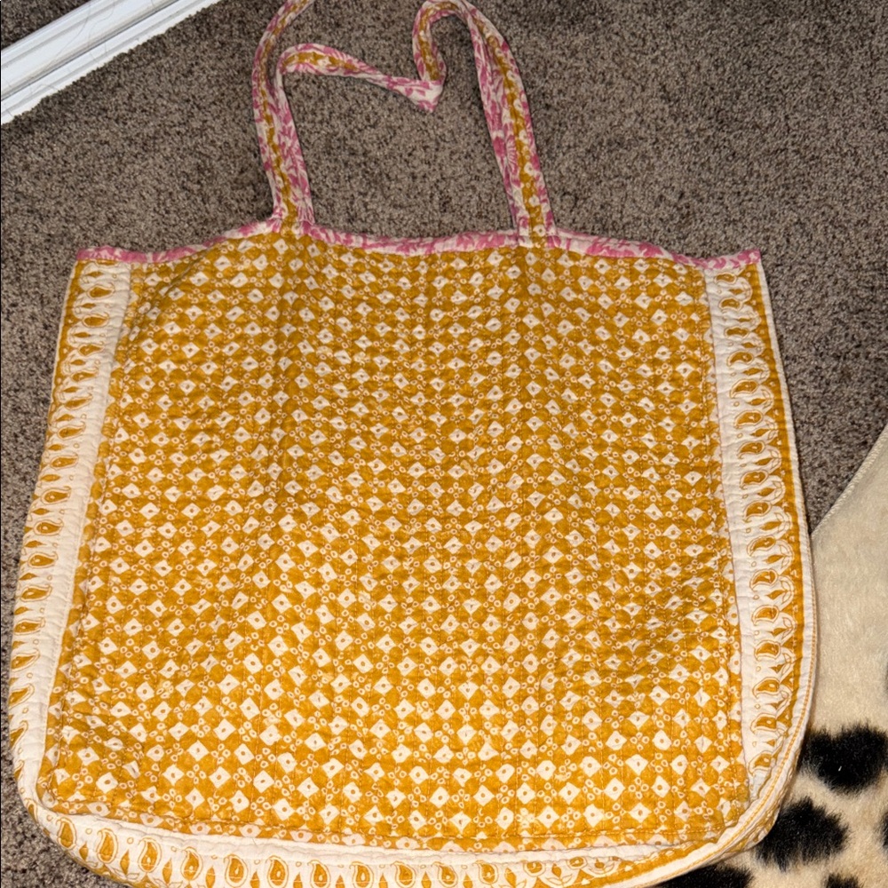 WORLD MARKET Yellow and pink REVERSABLE Printed Quilted Tote Bag with Pink Trim